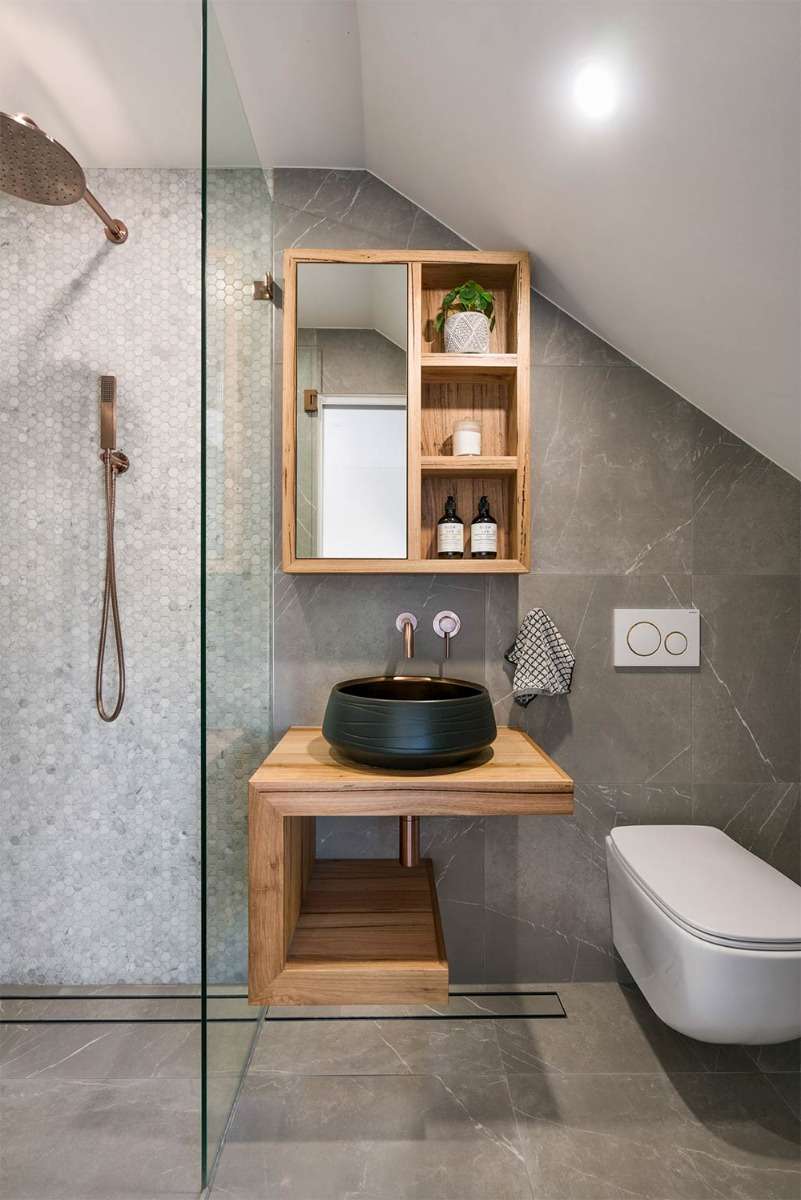 Stone Basins & Stone Bathtubs In An Open Design Bathroom