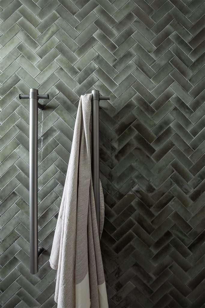 Vertical-Heated-Towel-Rail Herringbone Tile Pattern