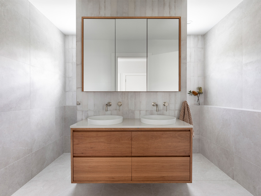 family bathroom layout with walk in shower timber vanity