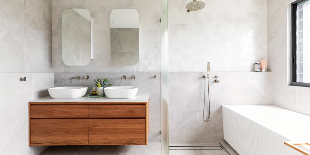 Ensuite bathroom with timber vanity and fluted glass shower screen