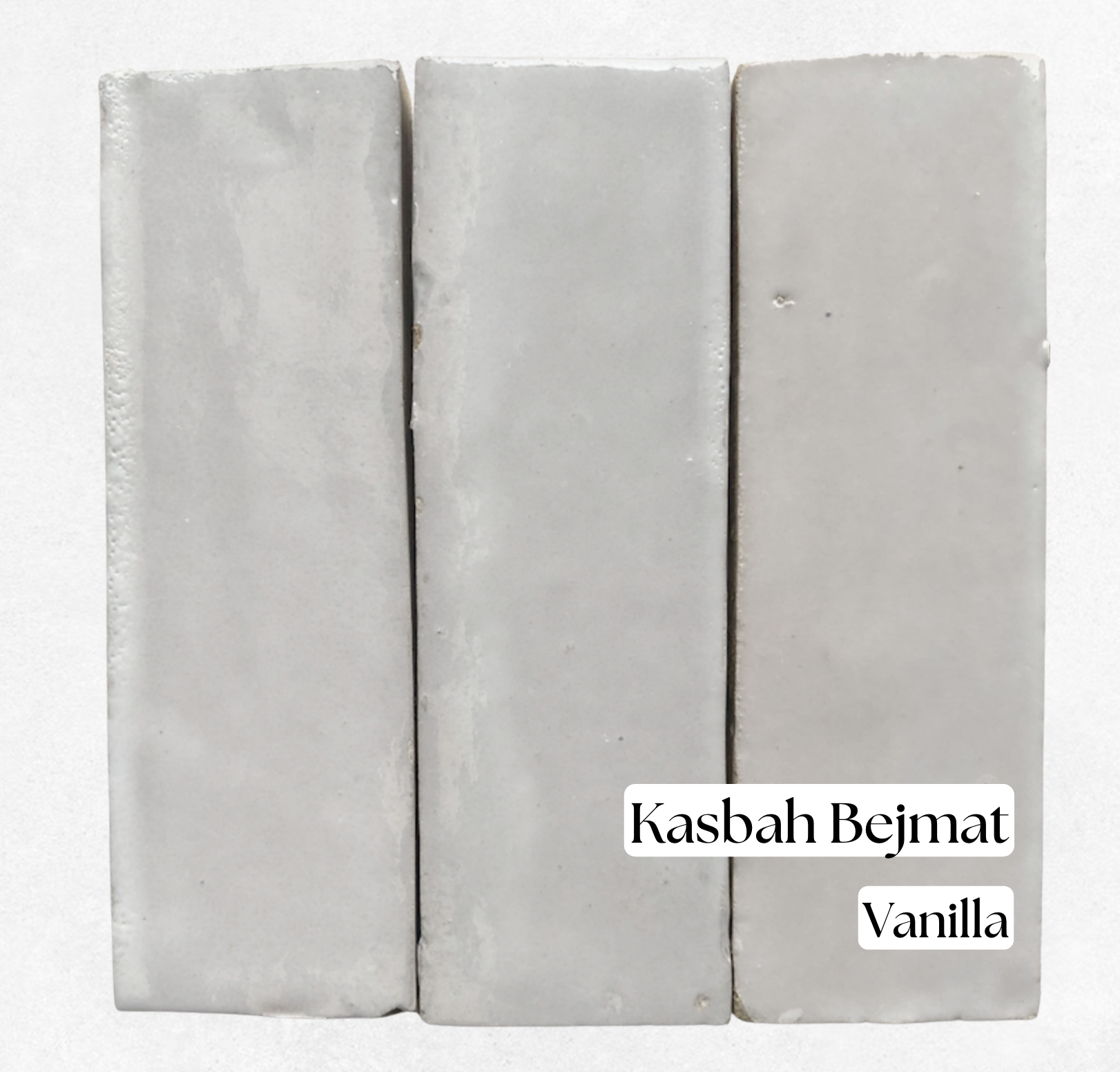 Three Kasbah Moroccan bejmat tiles in Vanilla, a glossy off-white handmade finish